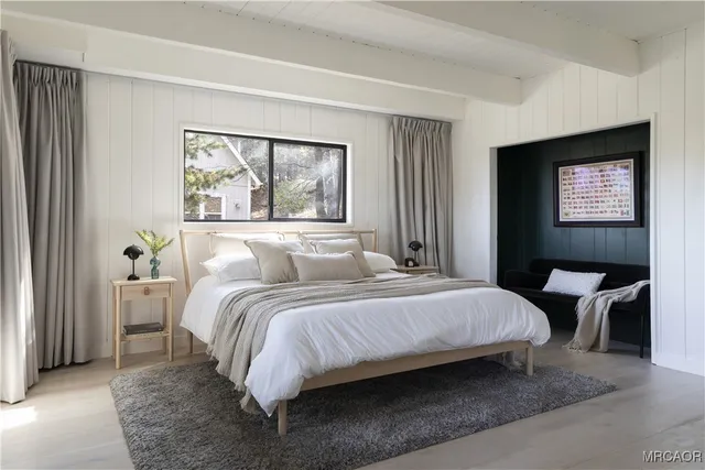 a living room with furniture and a bathtub