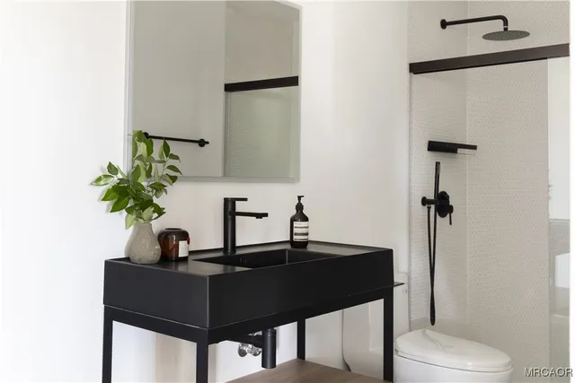 a bathroom with a sink and a toilet