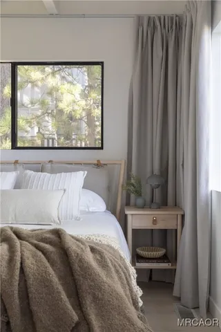 a bathroom with a sink toilet and a mirror