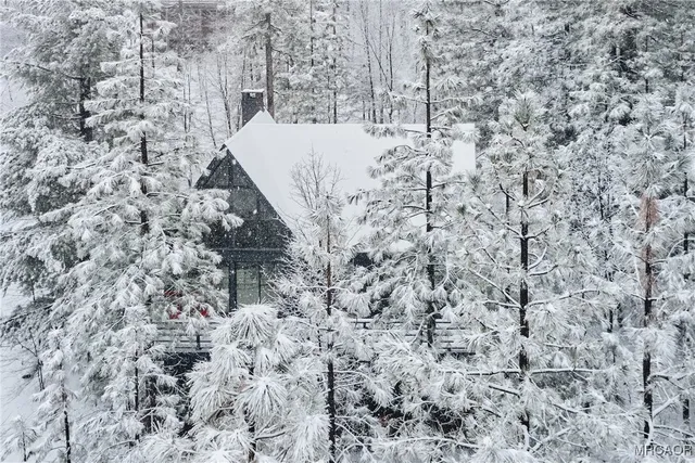 a view of a pathway covered with snow