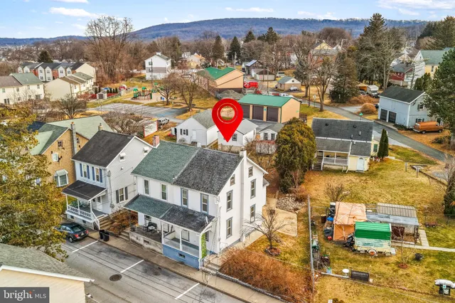 view of a brick building with many windows