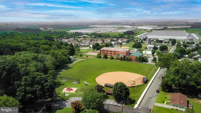 a view of houses with outdoor space and lake view
