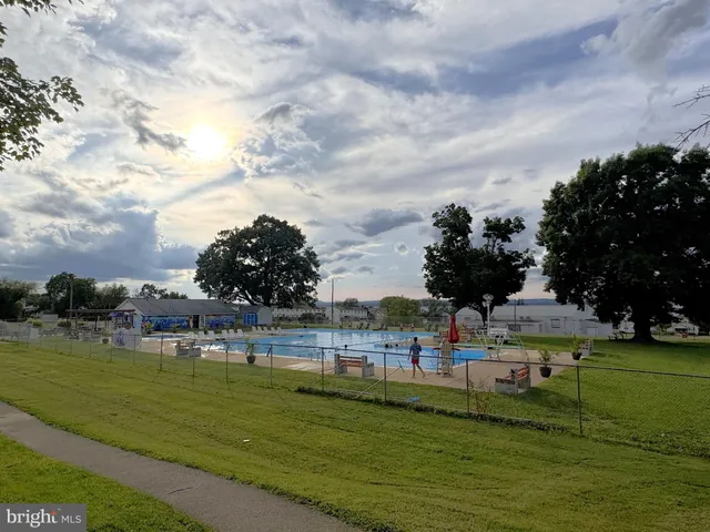 a view of a golf course with a park
