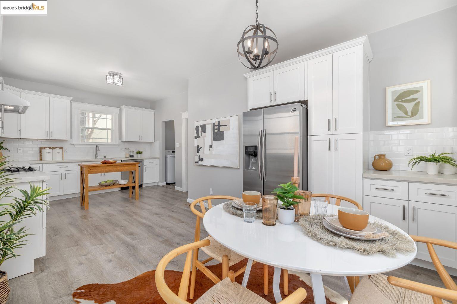 1837 7th Avenue Oakland, CA 94606 - Photo 14 of 42 a view of kitchen and dining area with furniture