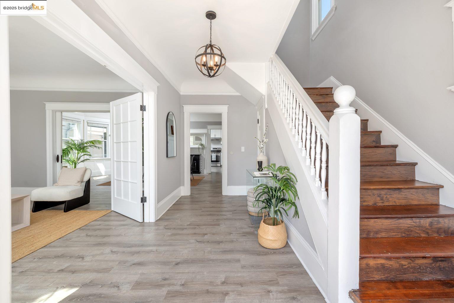1837 7th Avenue Oakland, CA 94606 - Photo 2 of 42 a view of entryway and hall with wooden floor