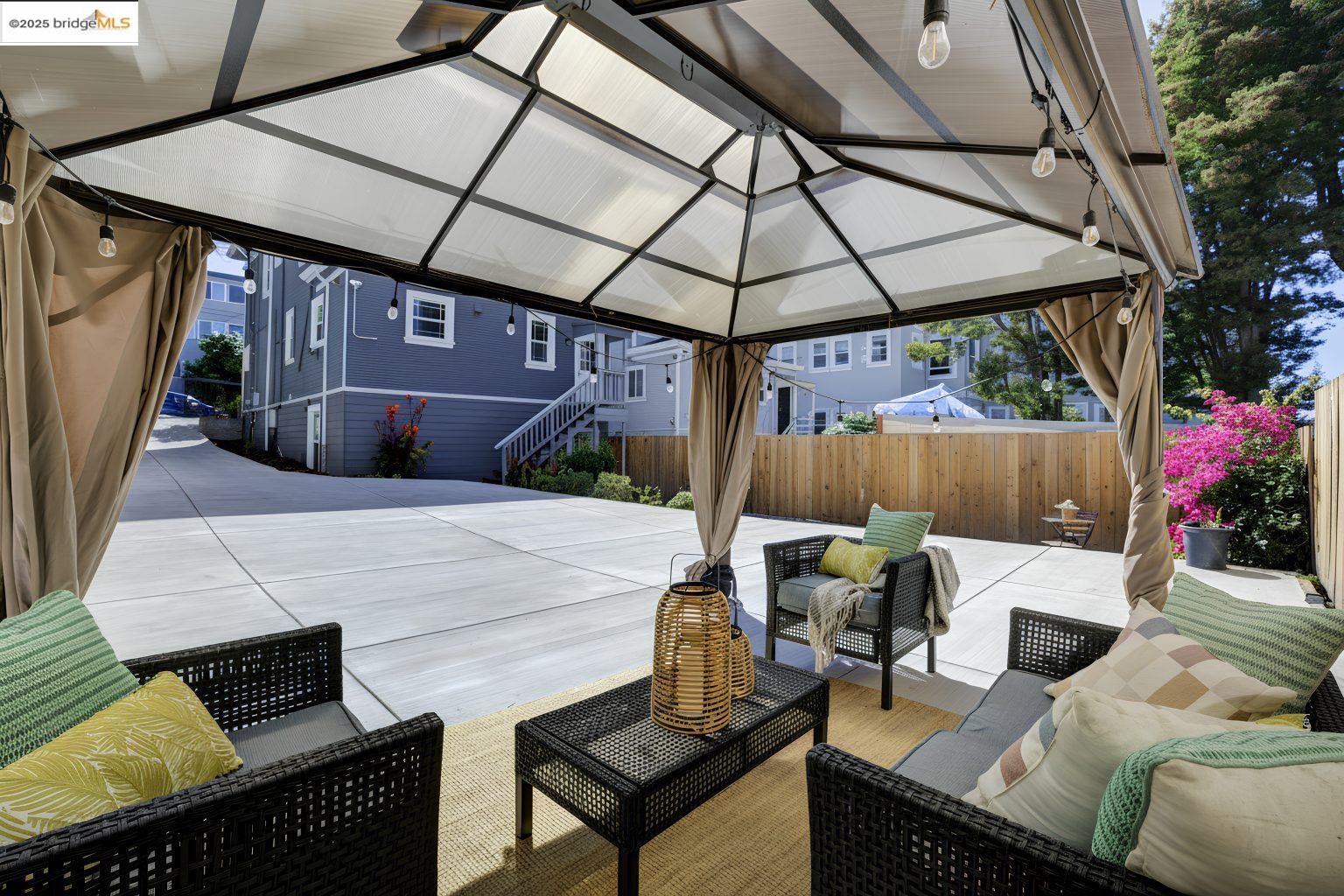 1837 7th Avenue Oakland, CA 94606 - Photo 37 of 42 a patio with table and chairs