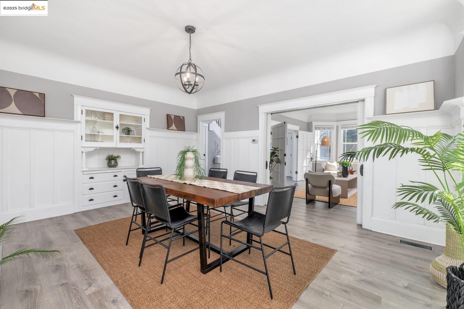 1837 7th Avenue Oakland, CA 94606 - Photo 9 of 42 a view of a dining room with furniture window and wooden floor