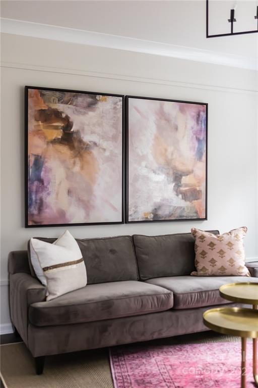 541 Madison Falls Court Fort Mill, SC 29708 - Photo 13 of 25 a living room with furniture and a painting on the wall