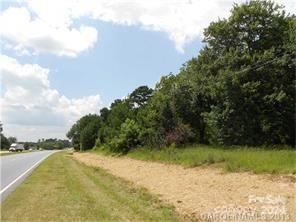 74 None Wadesboro, NC 28170 - Photo 3 of 4 a view of a lake with a yard