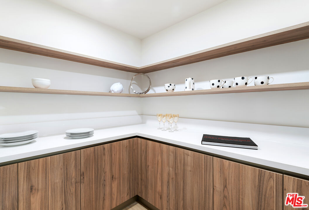 3649 Regal Place, Unit 503 Los Angeles, CA 90068 - Photo 16 of 40 a view of cabinets with wooden floor