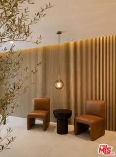 a view of a couch in wooden floor