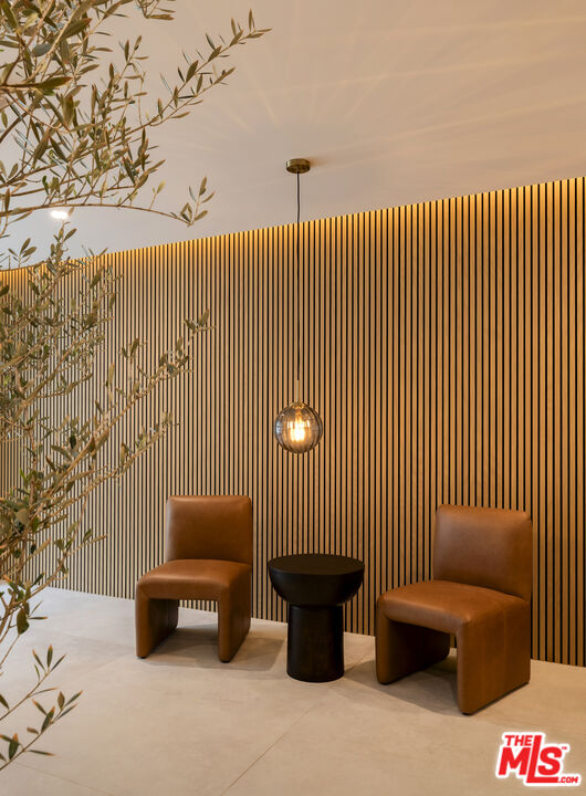 3649 Regal Place, Unit 503 Los Angeles, CA 90068 - Photo 4 of 40 a view of a couch in wooden floor