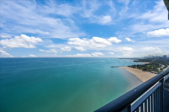 a view of a lake from a balcony