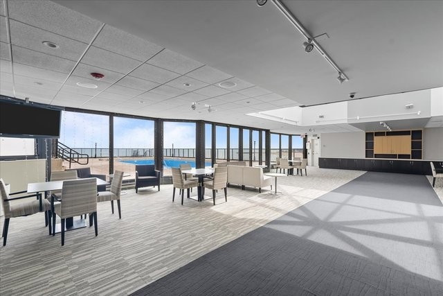 6007 North Sheridan Road, Unit 37B Chicago, IL 60660 - Photo 31 of 31 a view of a dining room with furniture window and outside view