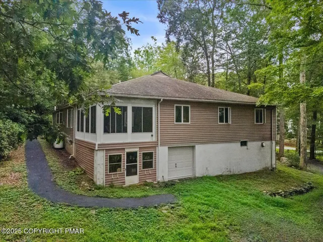 a house view with a outdoor space
