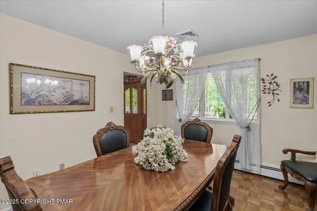 a spacious bedroom with a bed and a cabinets