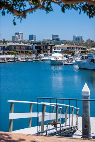 a view of a lake with tall buildings