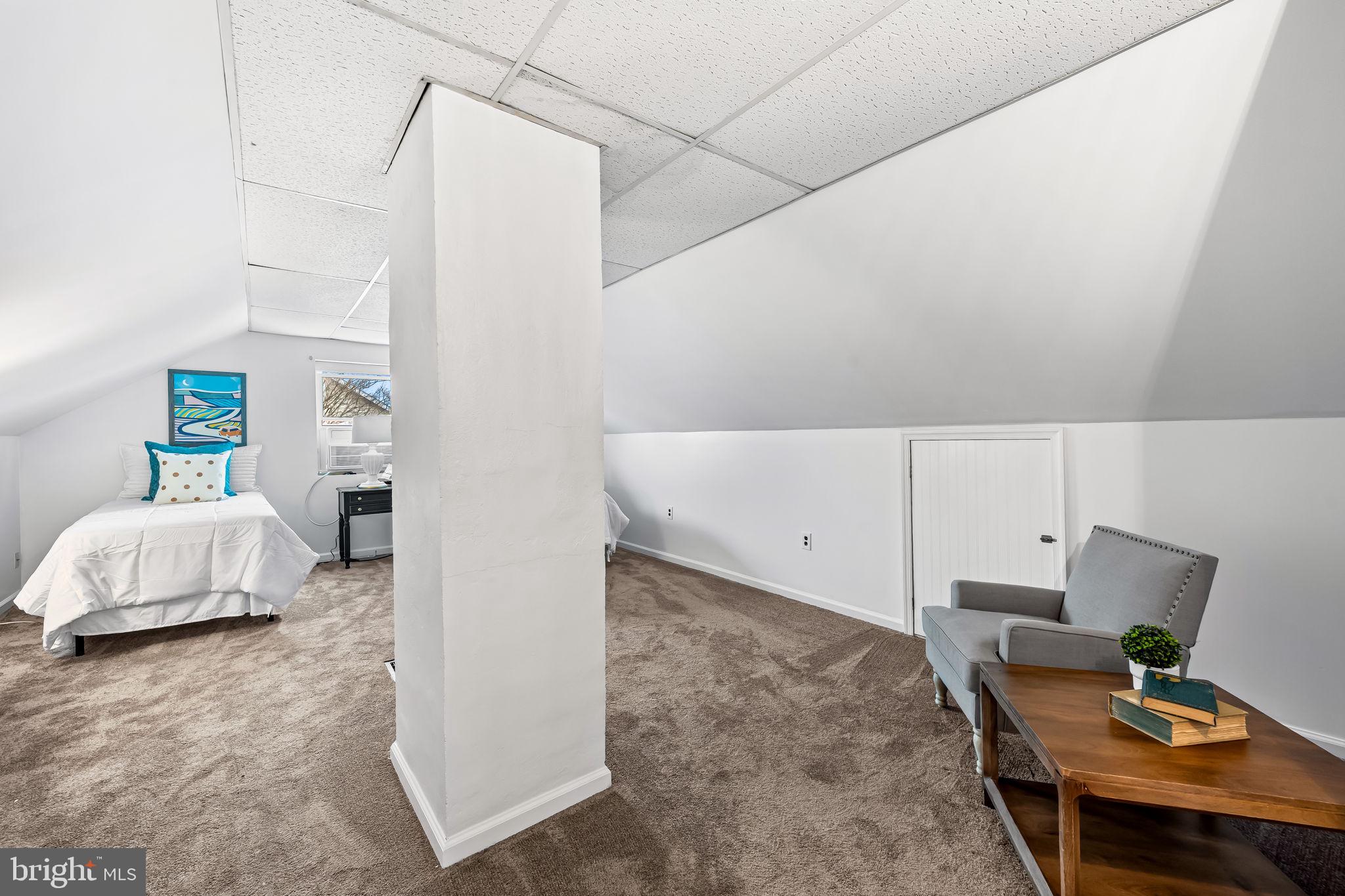 440 Cleveland Road Linthicum Heights, MD 21090 - Photo 19 of 28 a bedroom with furniture and a window