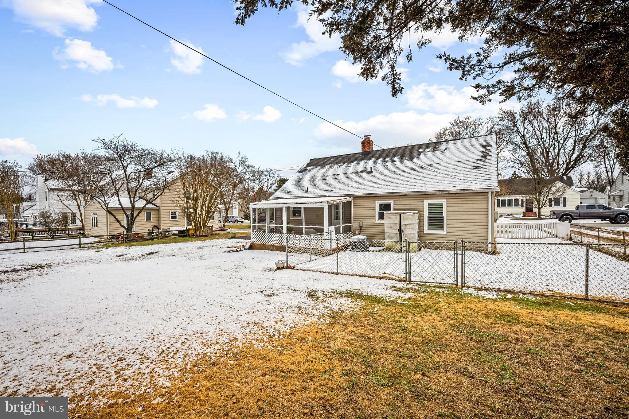 440 Cleveland Road Linthicum Heights, MD 21090 - Photo 25 of 28 a front view of a house with a yard and garage
