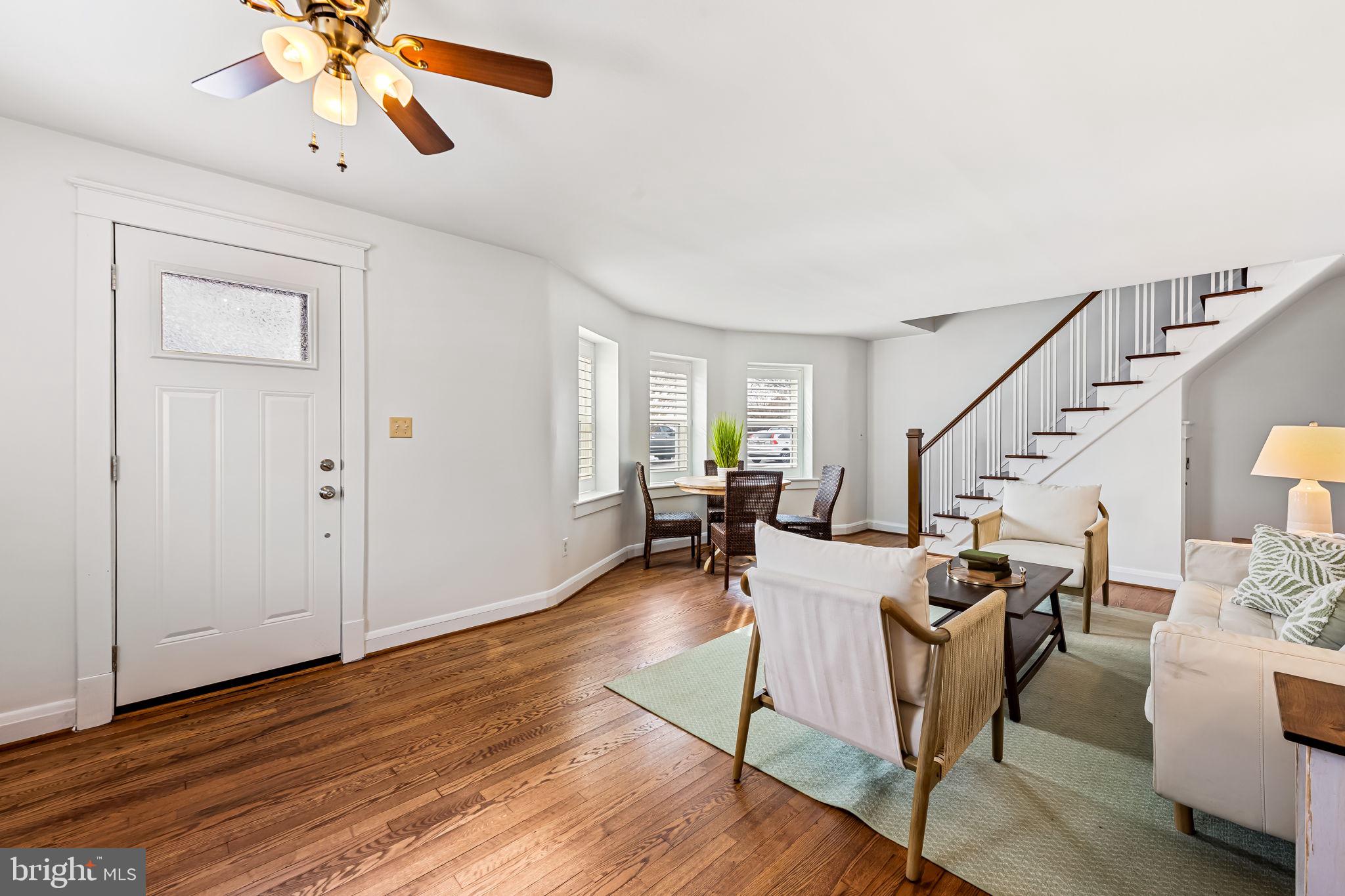 440 Cleveland Road Linthicum Heights, MD 21090 - Photo 4 of 28 a living room with couches chairs and closet with wooden floor