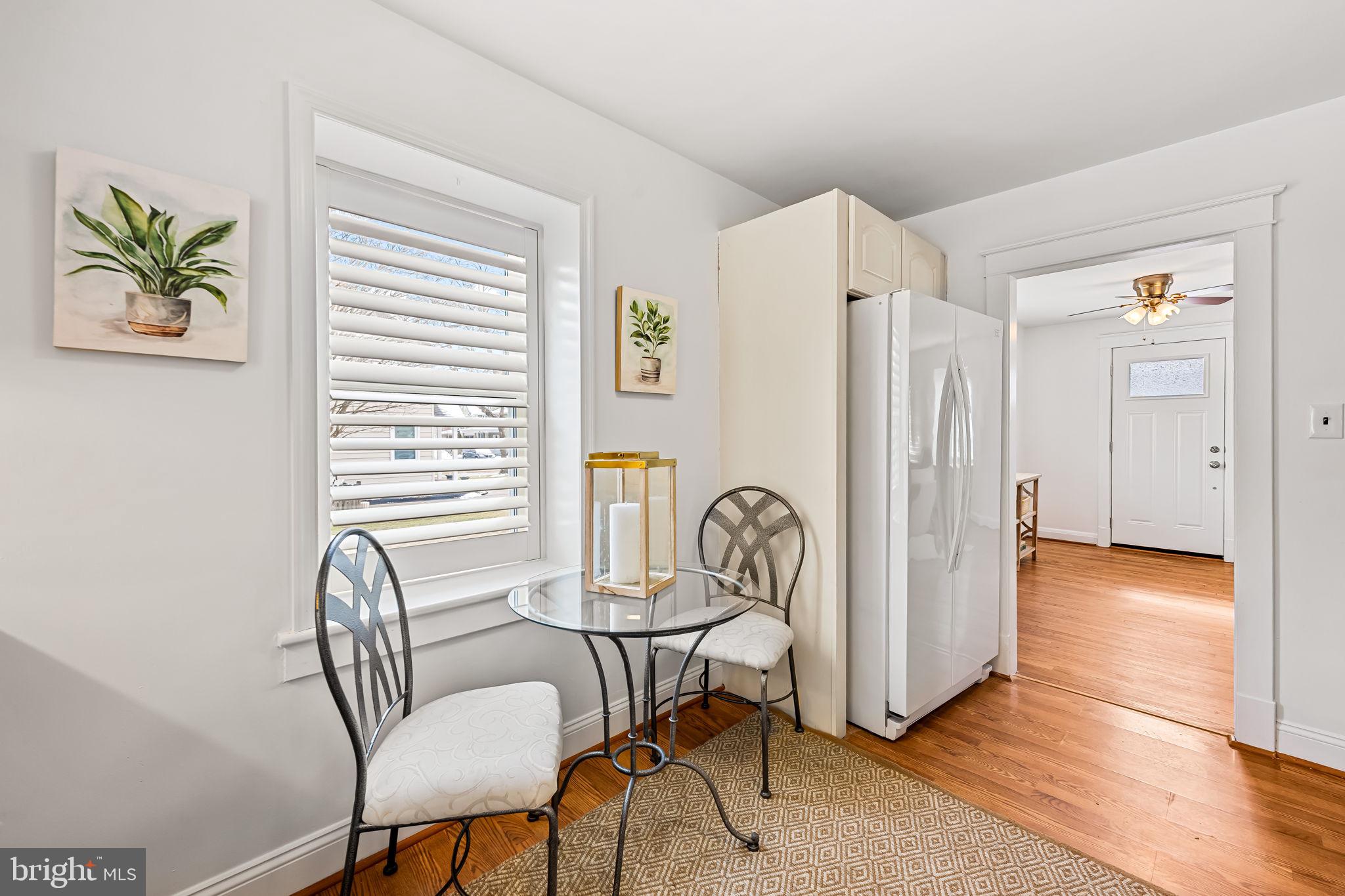 440 Cleveland Road Linthicum Heights, MD 21090 - Photo 10 of 28 a view of a dining room with furniture window and wooden floor
