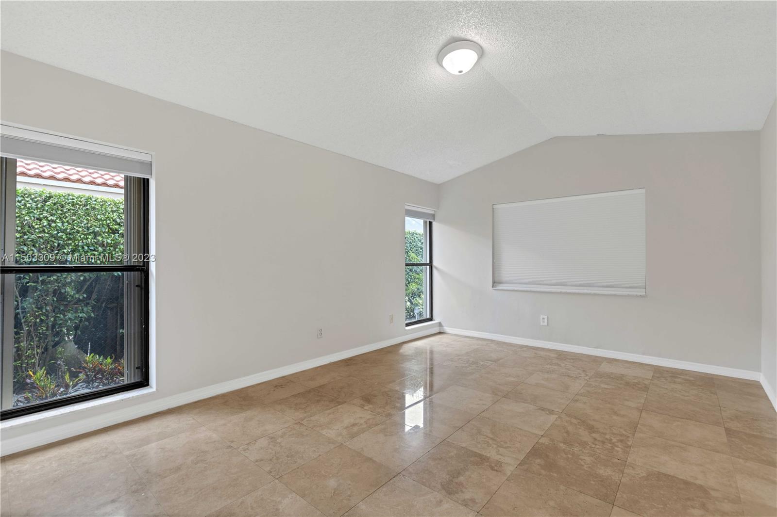 6242 Sweet Maple Lane Boca Raton, FL 33433 - Photo 14 of 31 an empty room with windows and closet