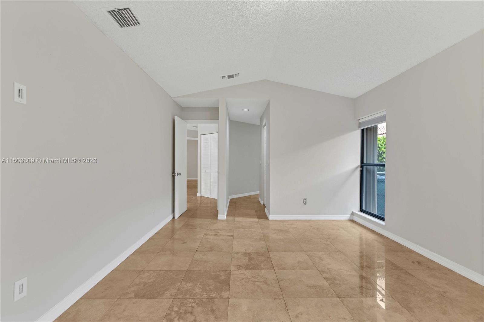 6242 Sweet Maple Lane Boca Raton, FL 33433 - Photo 15 of 31 a view of an empty room