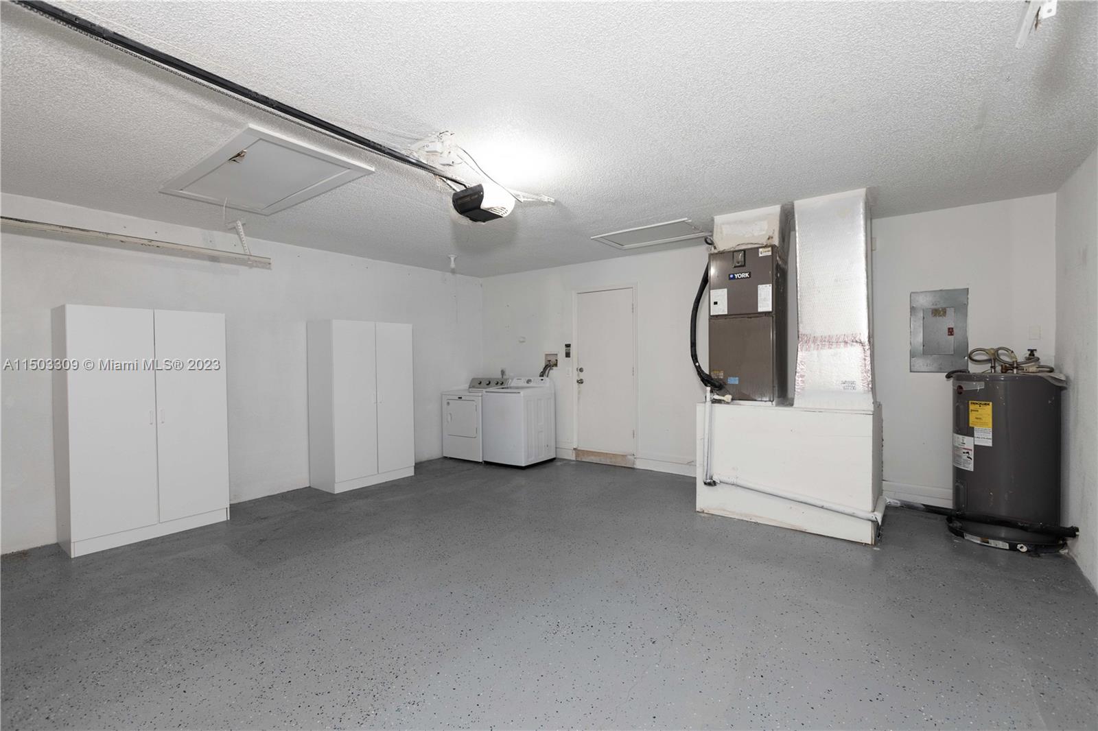 6242 Sweet Maple Lane Boca Raton, FL 33433 - Photo 22 of 31 a view of a room with utility room