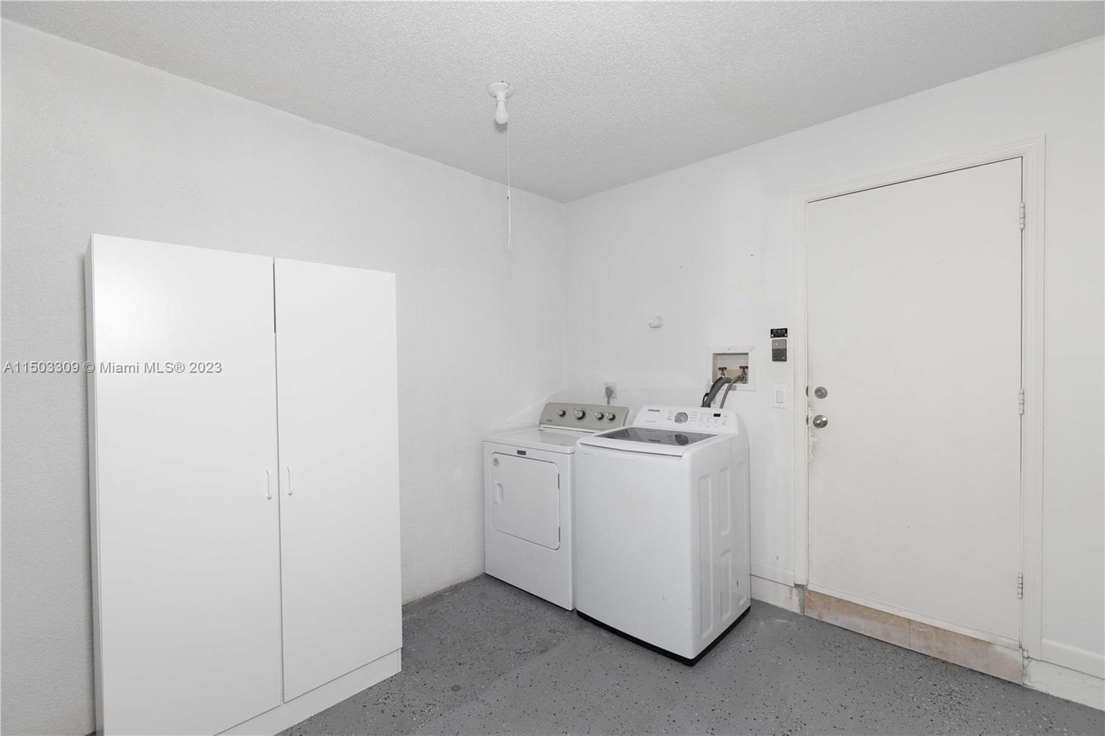 6242 Sweet Maple Lane Boca Raton, FL 33433 - Photo 23 of 31 a utility room with dryer and washer