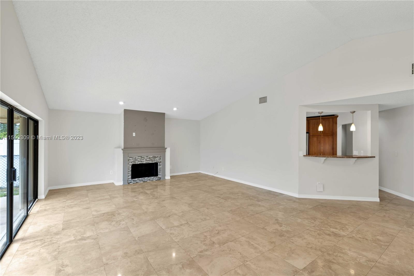 6242 Sweet Maple Lane Boca Raton, FL 33433 - Photo 5 of 31 a view of an empty room with a fireplace