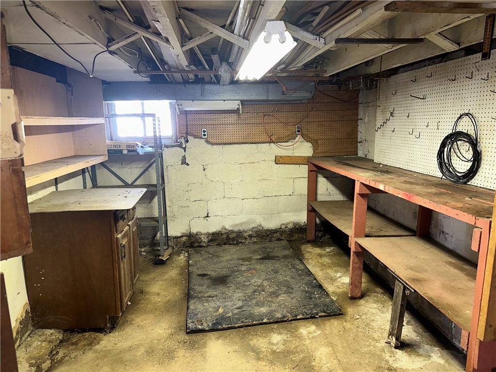 1423 Maratta Road Aliquippa, PA 15001 - Photo 12 of 22 a utility room with a wooden floor