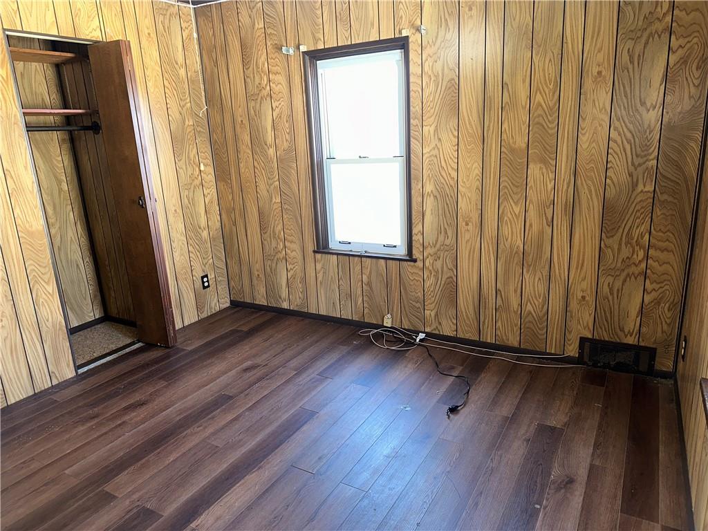 1423 Maratta Road Aliquippa, PA 15001 - Photo 16 of 22 an empty room with wooden floor and a window