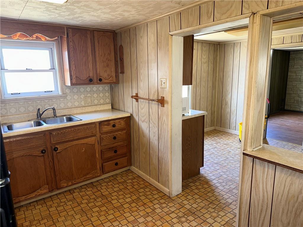 1423 Maratta Road Aliquippa, PA 15001 - Photo 4 of 22 a kitchen with stainless steel appliances granite countertop a refrigerator and a sink