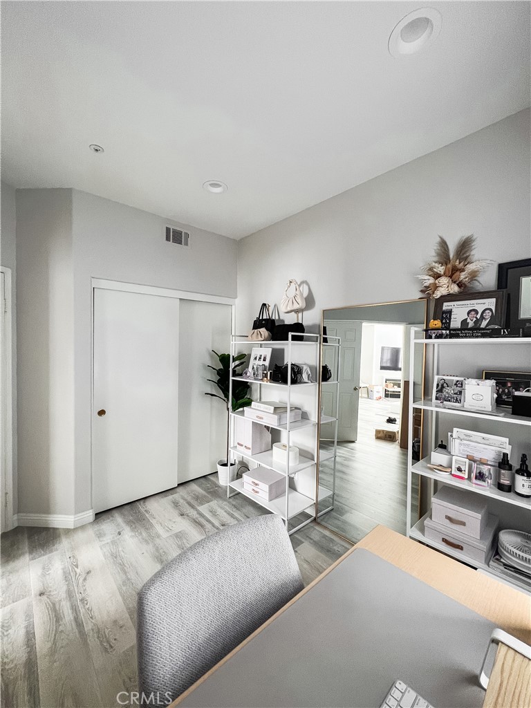 151 Islington Irvine, CA 92620 - Photo 9 of 15 a living room with furniture and a kitchen view