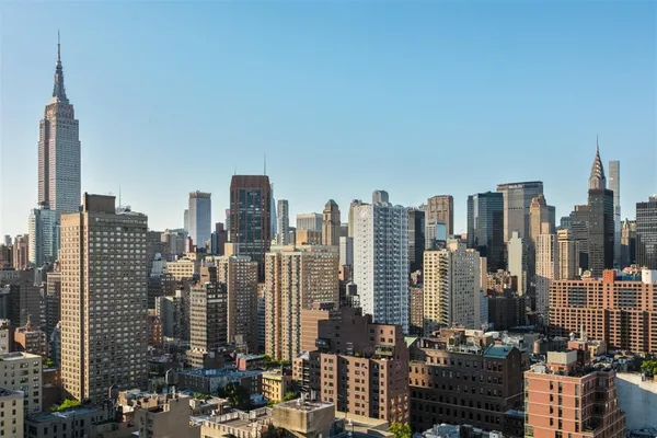 a view of city and tall buildings