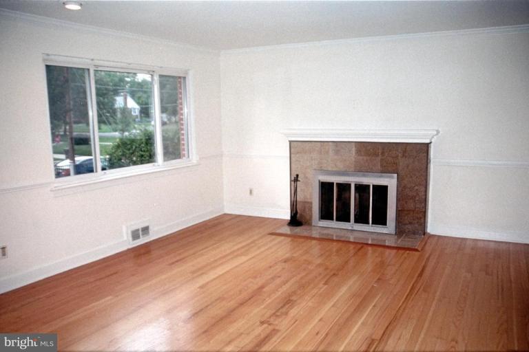 6003 Brunswick Street Springfield, VA 22150 - Photo 2 of 17 Fresh paint & gleaming hardwood floors.