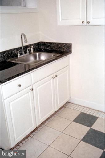 6003 Brunswick Street Springfield, VA 22150 - Photo 14 of 17 Lower level party room w/fridge & wet bar.