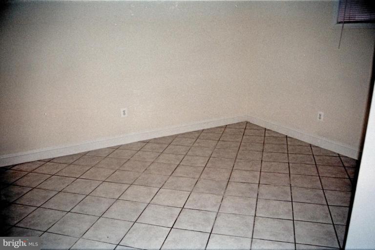 6003 Brunswick Street Springfield, VA 22150 - Photo 16 of 17 New ceramic tile & fresh paint.