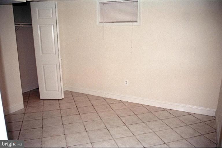 6003 Brunswick Street Springfield, VA 22150 - Photo 17 of 17 New ceramic tile and fresh paint.