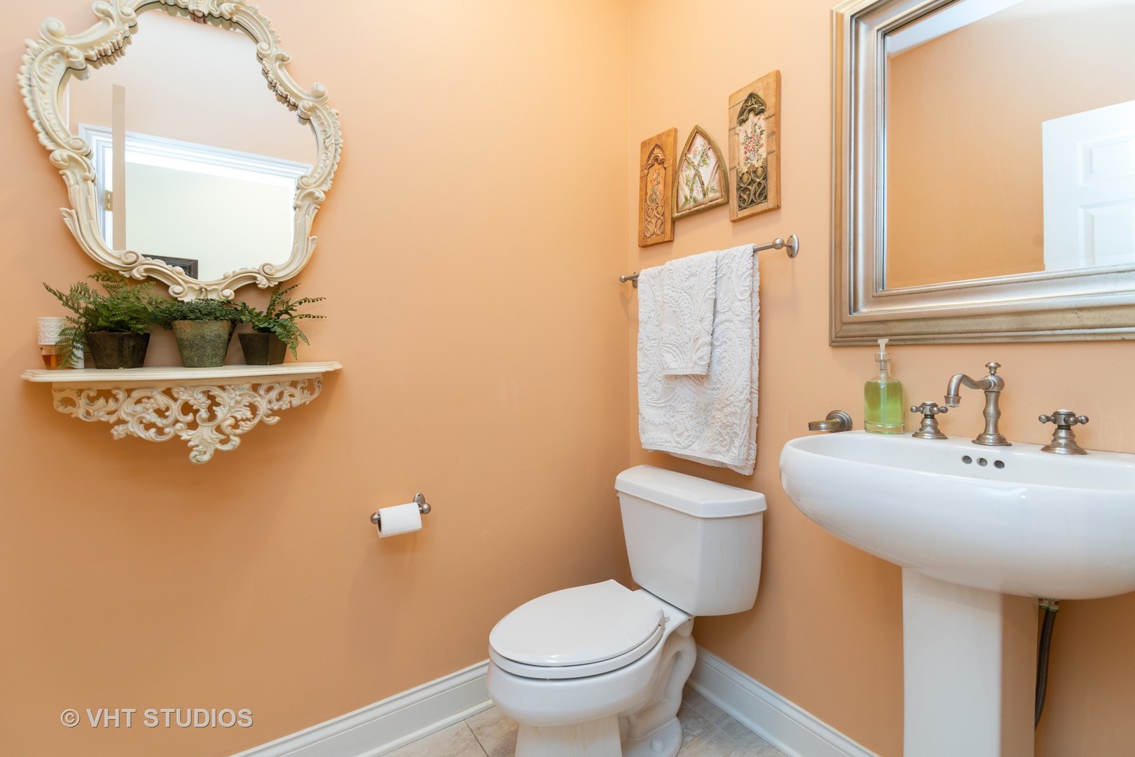 8 Torrin Rocks Cove Inverness, IL 60010 - Photo 15 of 30 a bathroom with a toilet sink and mirror