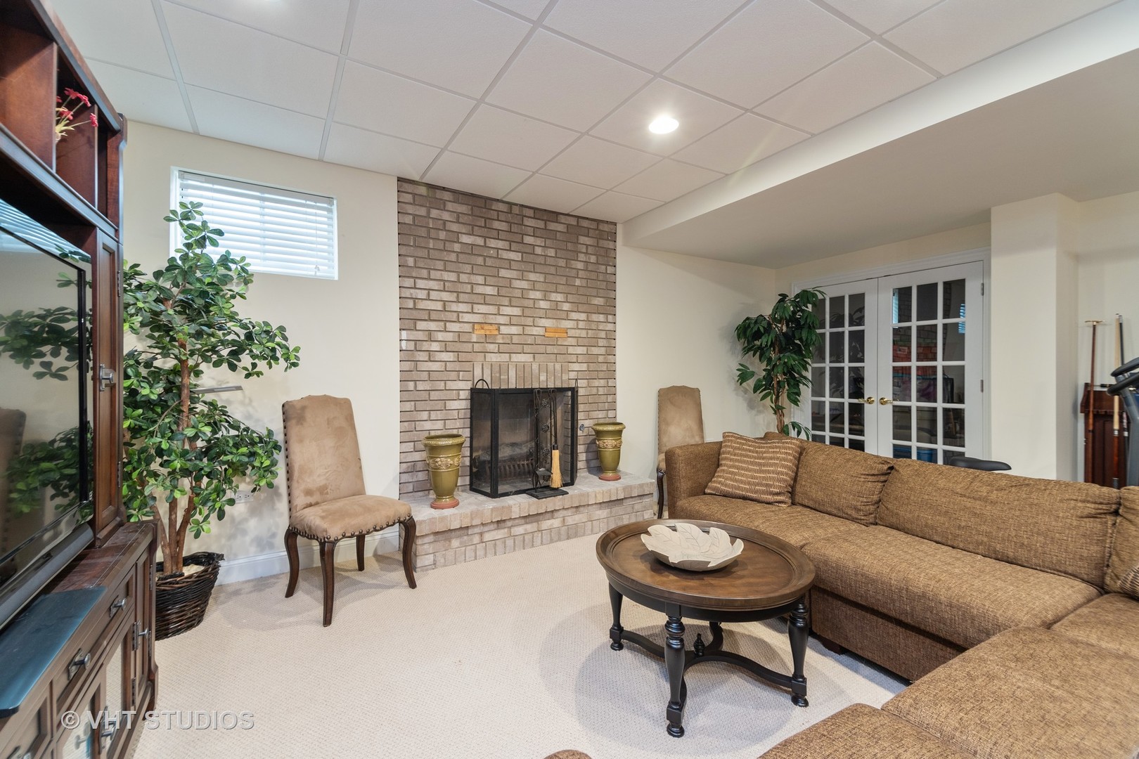 8 Torrin Rocks Cove Inverness, IL 60010 - Photo 26 of 30 a living room with furniture and a fireplace