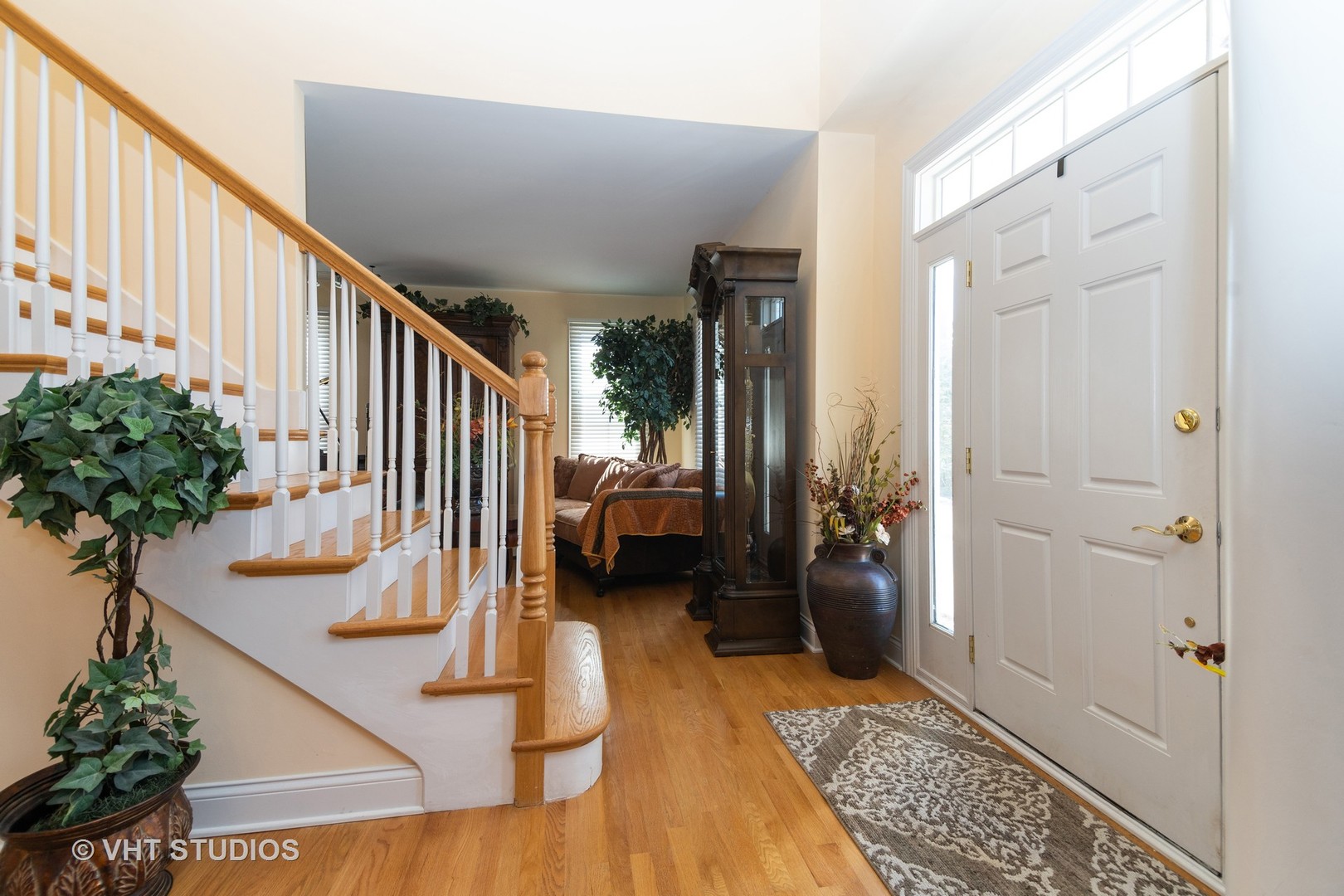 8 Torrin Rocks Cove Inverness, IL 60010 - Photo 3 of 30 a view of entryway and hall with wooden floor
