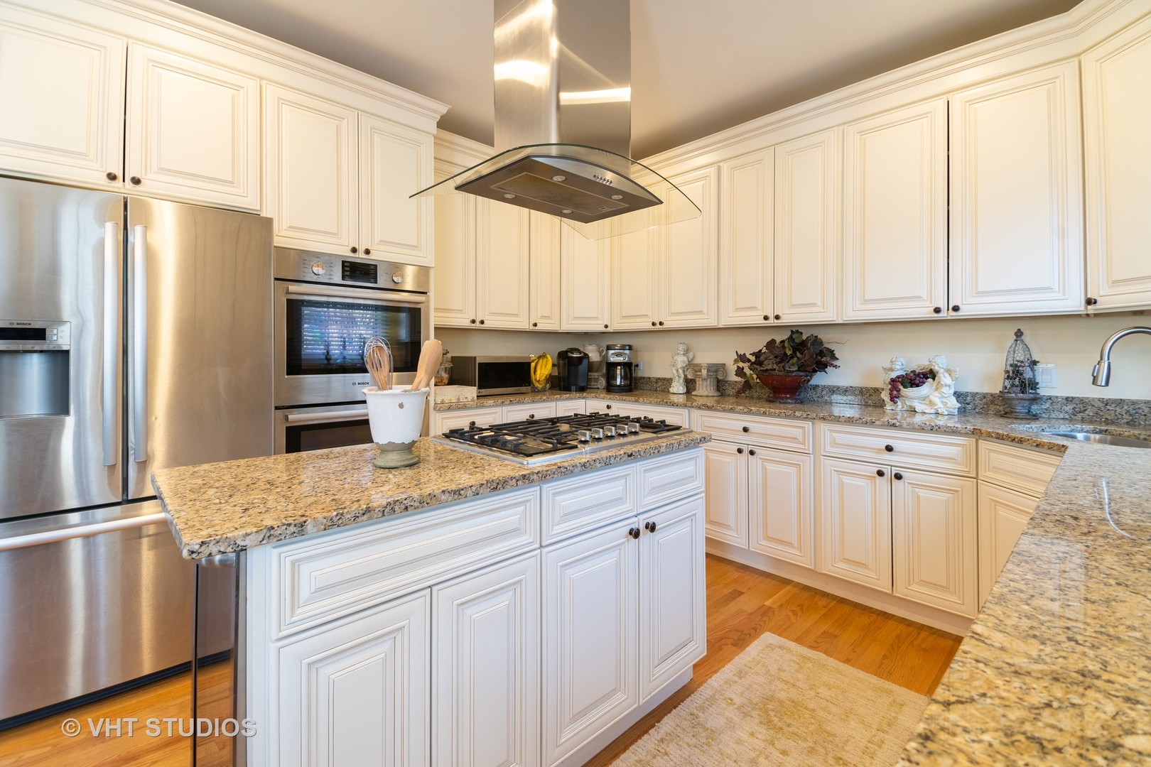8 Torrin Rocks Cove Inverness, IL 60010 - Photo 6 of 30 a kitchen with stainless steel appliances granite countertop a sink a stove a refrigerator cabinets and a window