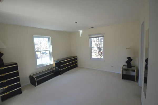 a view of room with stairs and a window
