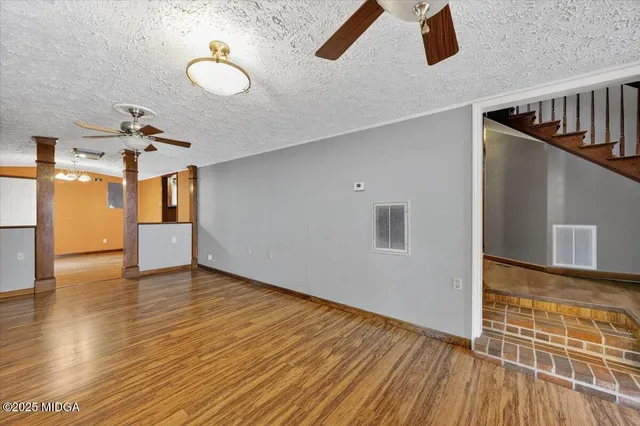 a kitchen with stainless steel appliances granite countertop a stove and a sink