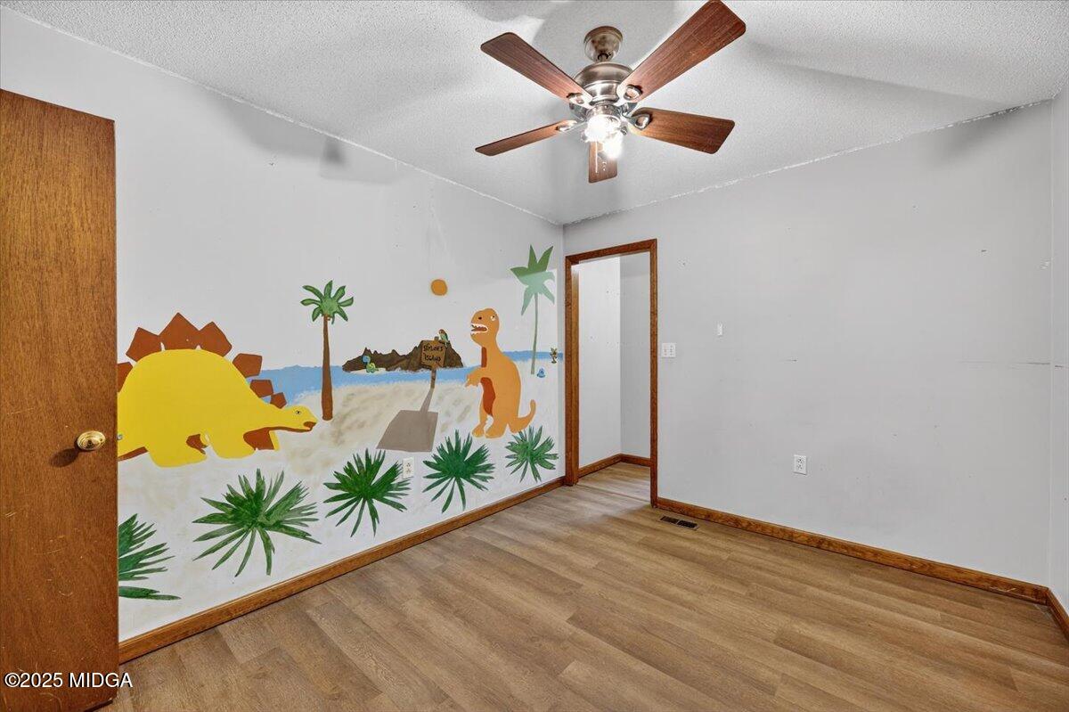 5682 Hartley Bridge Road Macon, GA 31216 - Photo 26 of 79 an entryway with wooden floor