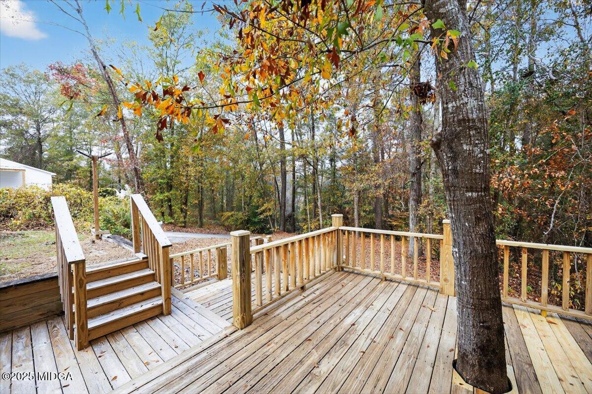 5682 Hartley Bridge Road Macon, GA 31216 - Photo 53 of 79 a view of deck with chairs and wooden fence
