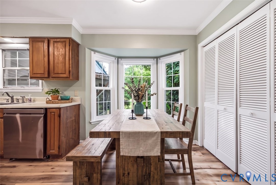 137 Sand Hill Road Toano, VA 23168 - Photo 11 of 20 Bay window with exterior views, crown molding, woo