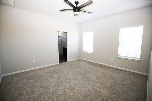a bathroom with a double vanity sink and mirror