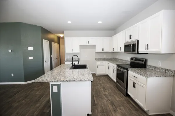 a view of small space with empty racks on the wall